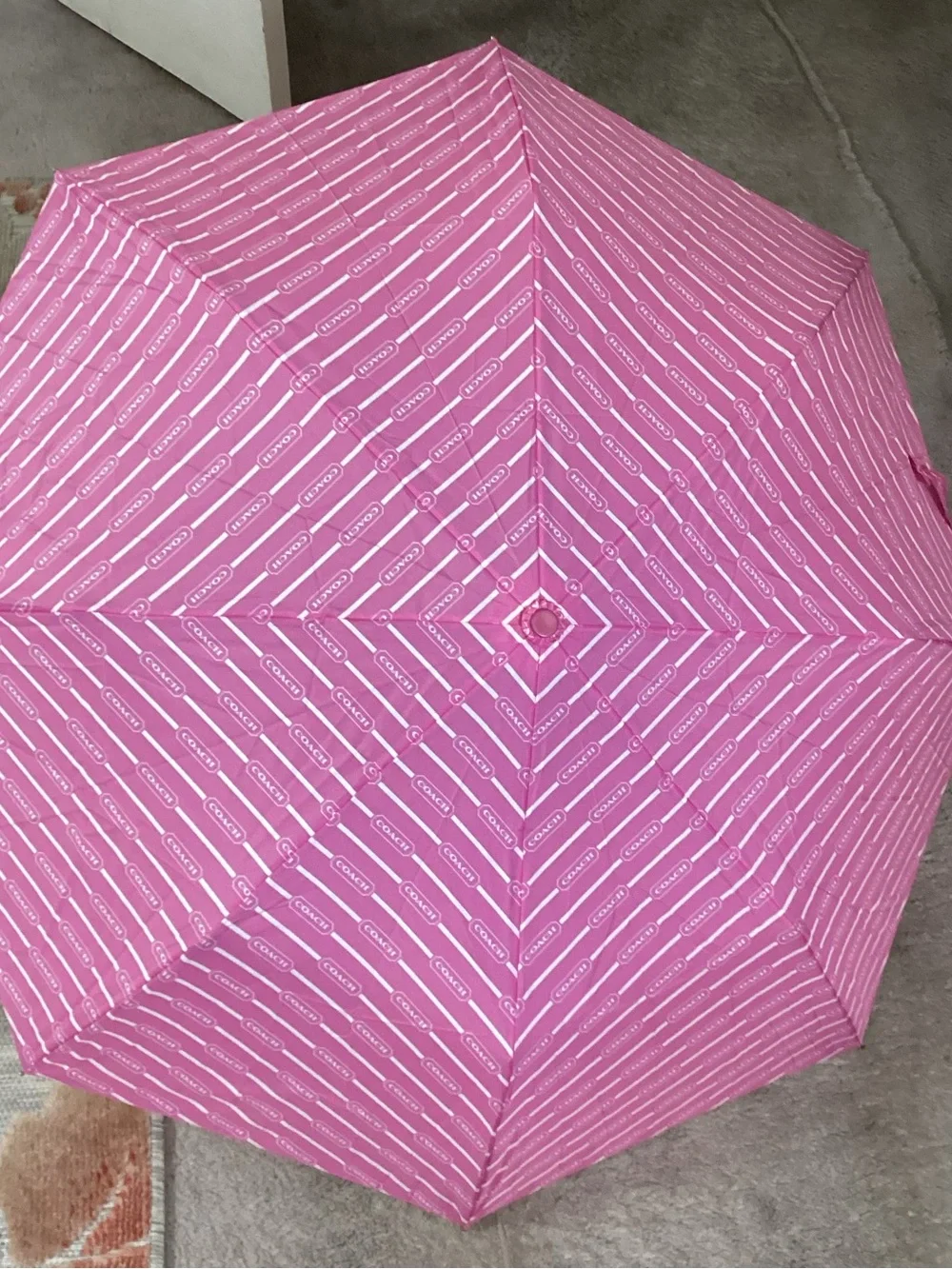 Coach Pink Compact Umbrella with Gold Wrist Strap
